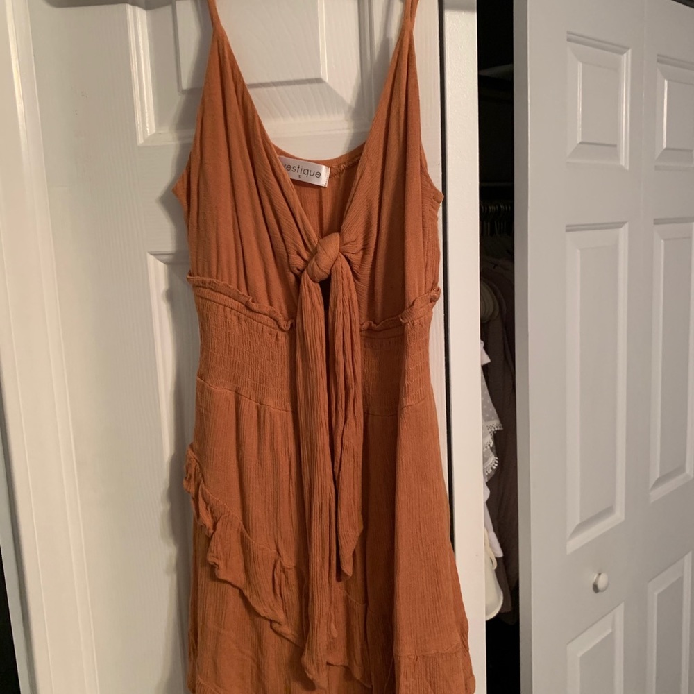Vestique burnt orange romper